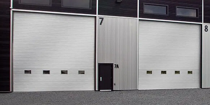 fix bent garage door in London